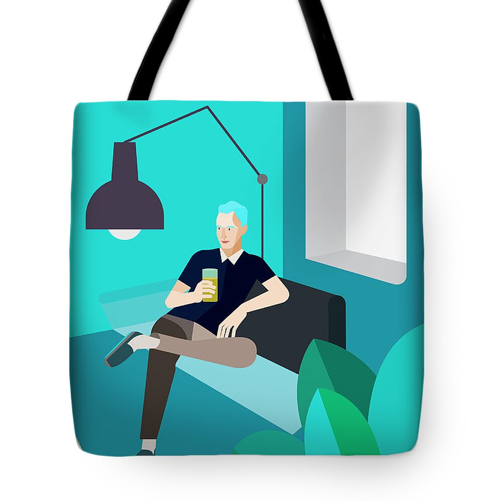 20-25 Tote Bag featuring the photograph Man Relaxing On Sofa With Drink by Ikon Ikon Images