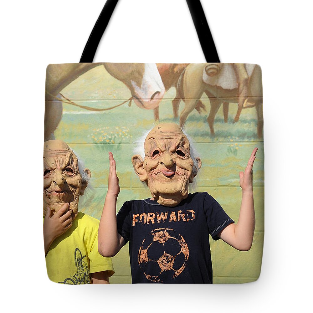 Portrait Tote Bag featuring the photograph Masks and Murals in Big Timber Montana by Mary Lee Dereske
