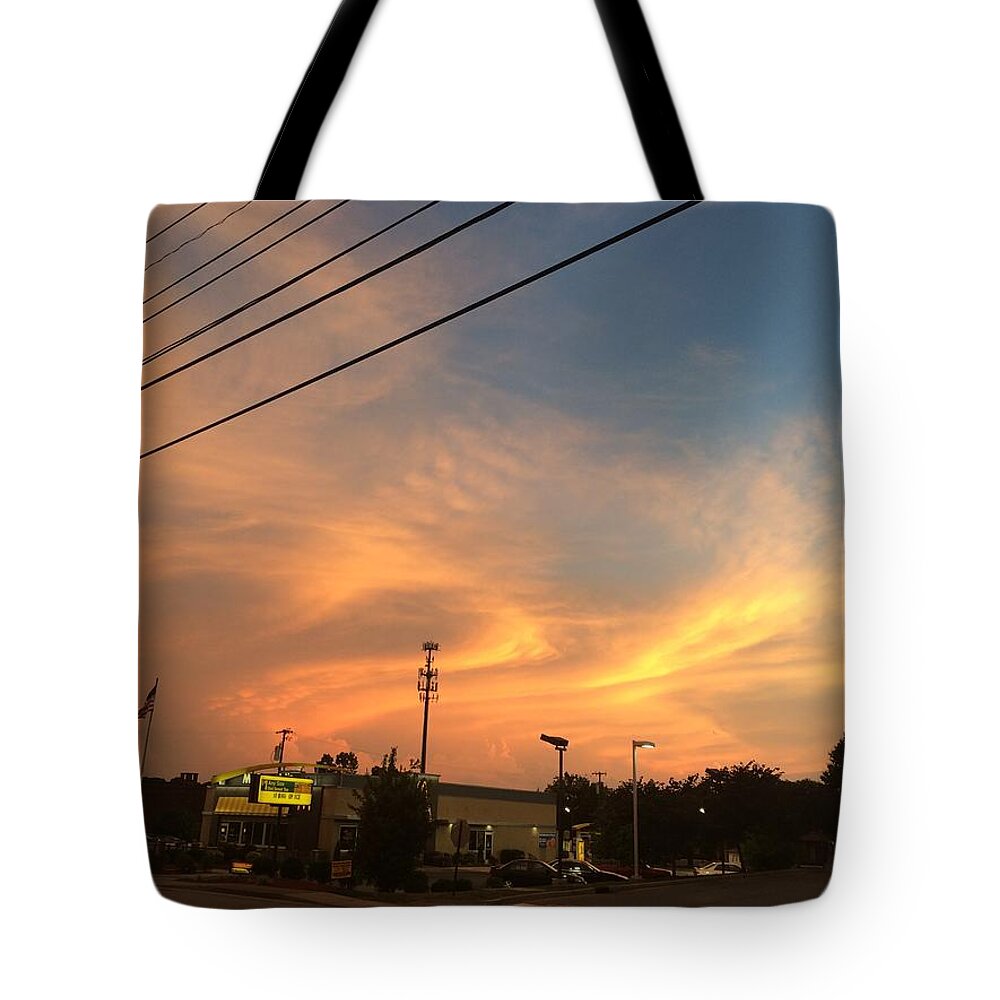 Mcdonalds Tote Bag featuring the photograph McDonalds in Donelson sky mayhem by Steve Sommers