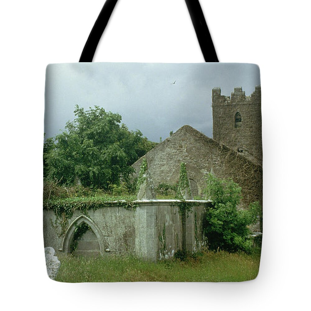 Medieval Church And Churchyard (photo) Site; Remains; Ruin; Ruined; Celtic; Rural; Abandonded; Gravestone; Irish; Goth Tote Bag featuring the painting Medieval church and churchyard by Unknown