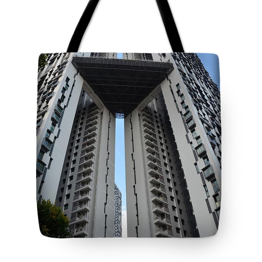 Singapore Tote Bag featuring the photograph Modern skyscraper apartment building Singapore by Imran Ahmed