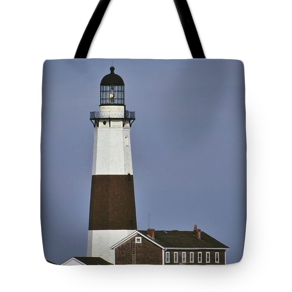 Lighthouse Tote Bag featuring the photograph Montauk Lighthouse with snow by Bradford Martin