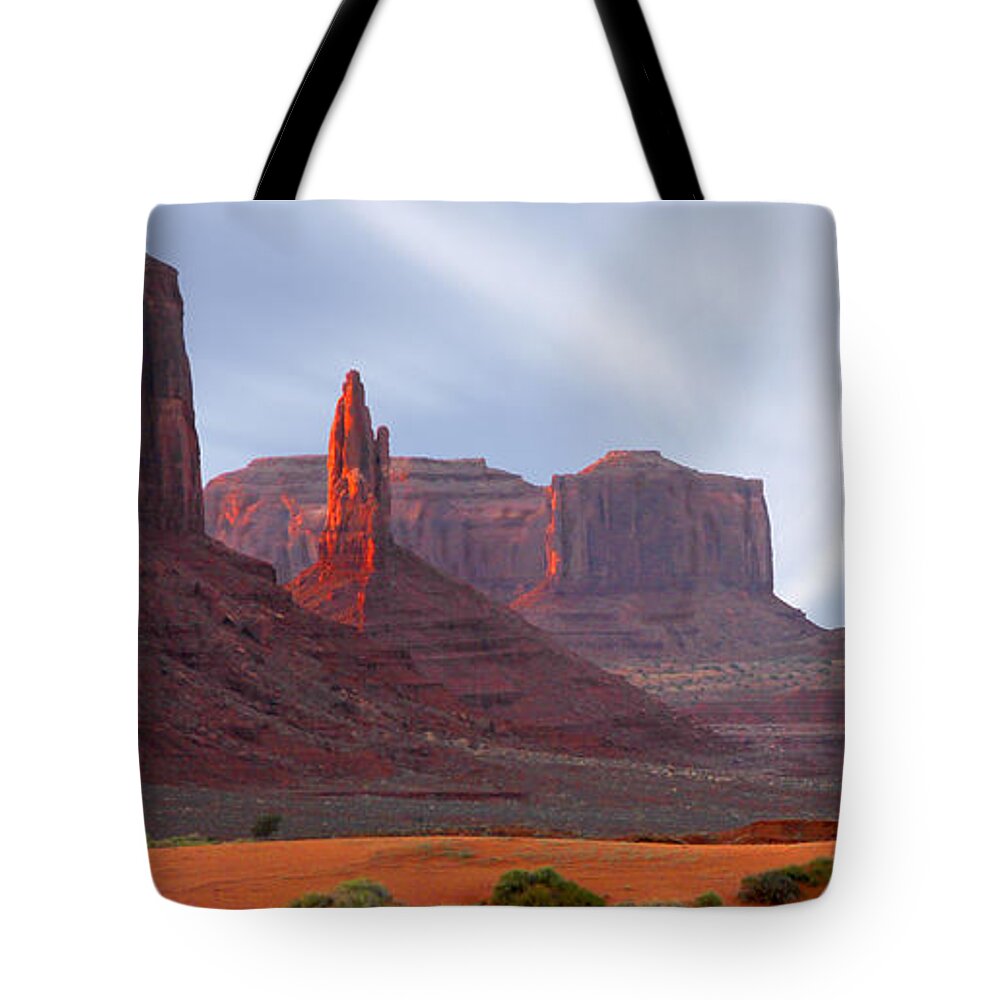 Desert Tote Bag featuring the photograph Monument Valley at Sunset Panoramic by Mike McGlothlen