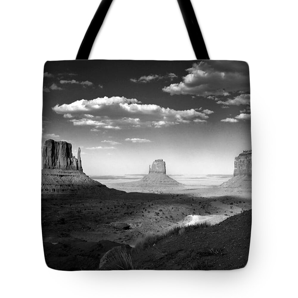 Travel Tote Bag featuring the photograph Monument Valley in Black and White by Lucinda Walter