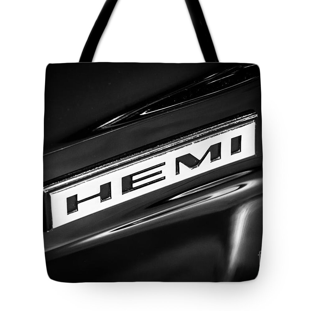 Chrysler Tote Bag featuring the photograph Mopar Hemi Emblem Black and White Picture by Paul Velgos