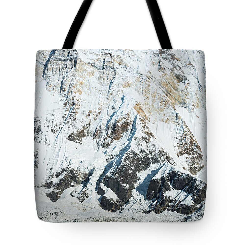 Scenics Tote Bag featuring the photograph Mountaineer Looking At Annapurna 8091m by Fotovoyager