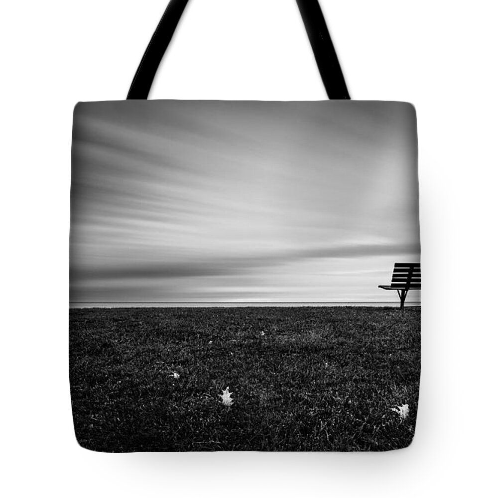 Sheridan Park St. Francis Cudahy Bench Le Tote Bag featuring the photograph Moving Still by Josh Eral
