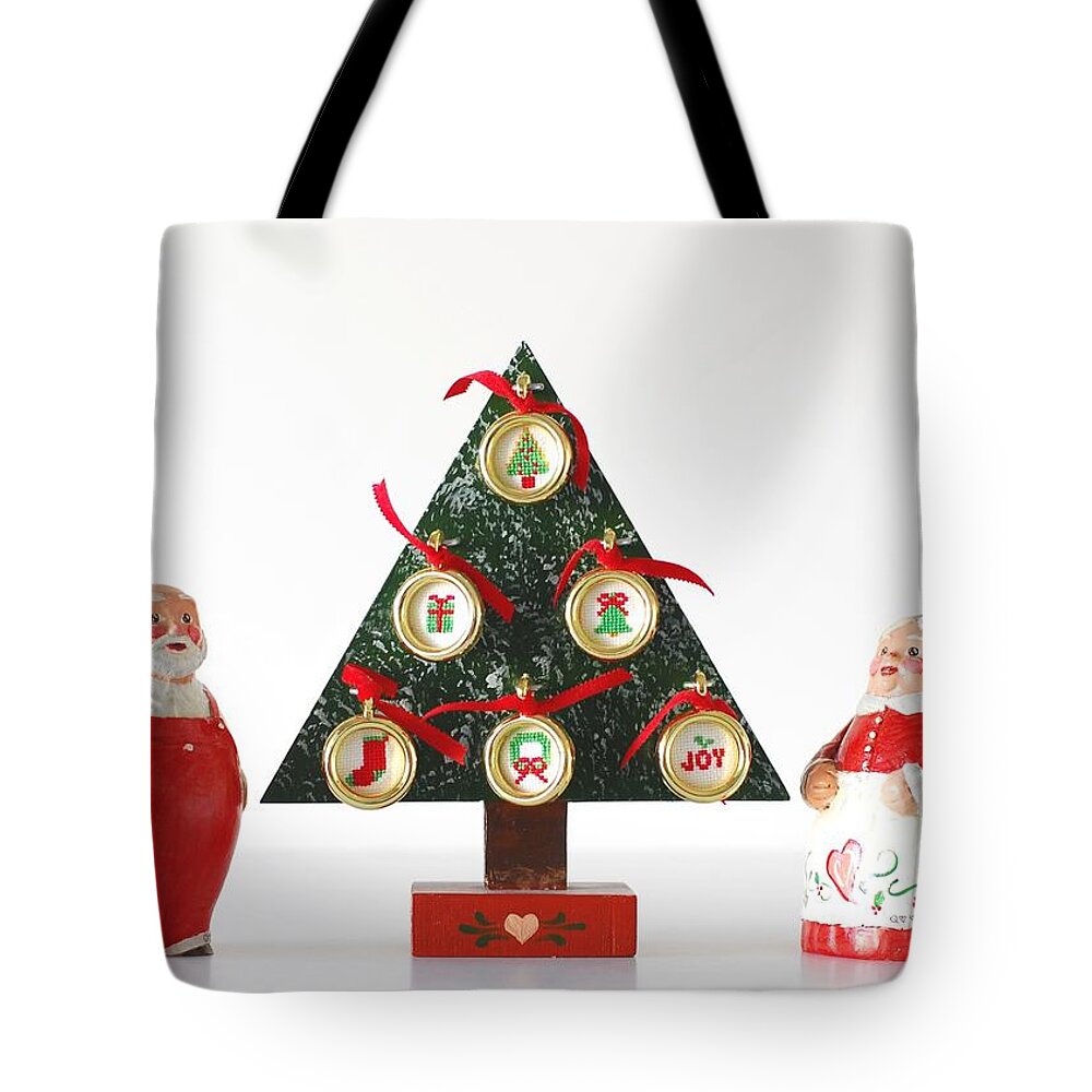 Santa Tote Bag featuring the photograph Mr. and Mrs. Santa by Quwatha Valentine