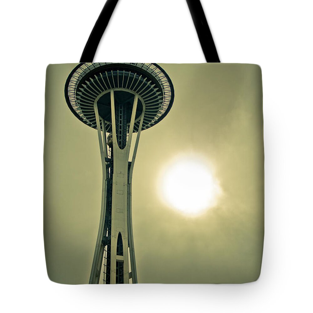 Symbolizes Tote Bag featuring the photograph Needle in a cloud stack by Eti Reid