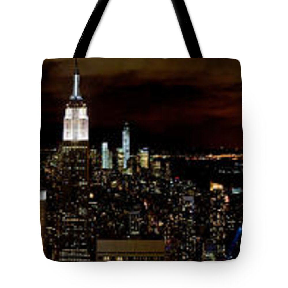 New York Skyline Tote Bag featuring the photograph New York at night panorama by Gary Eason
