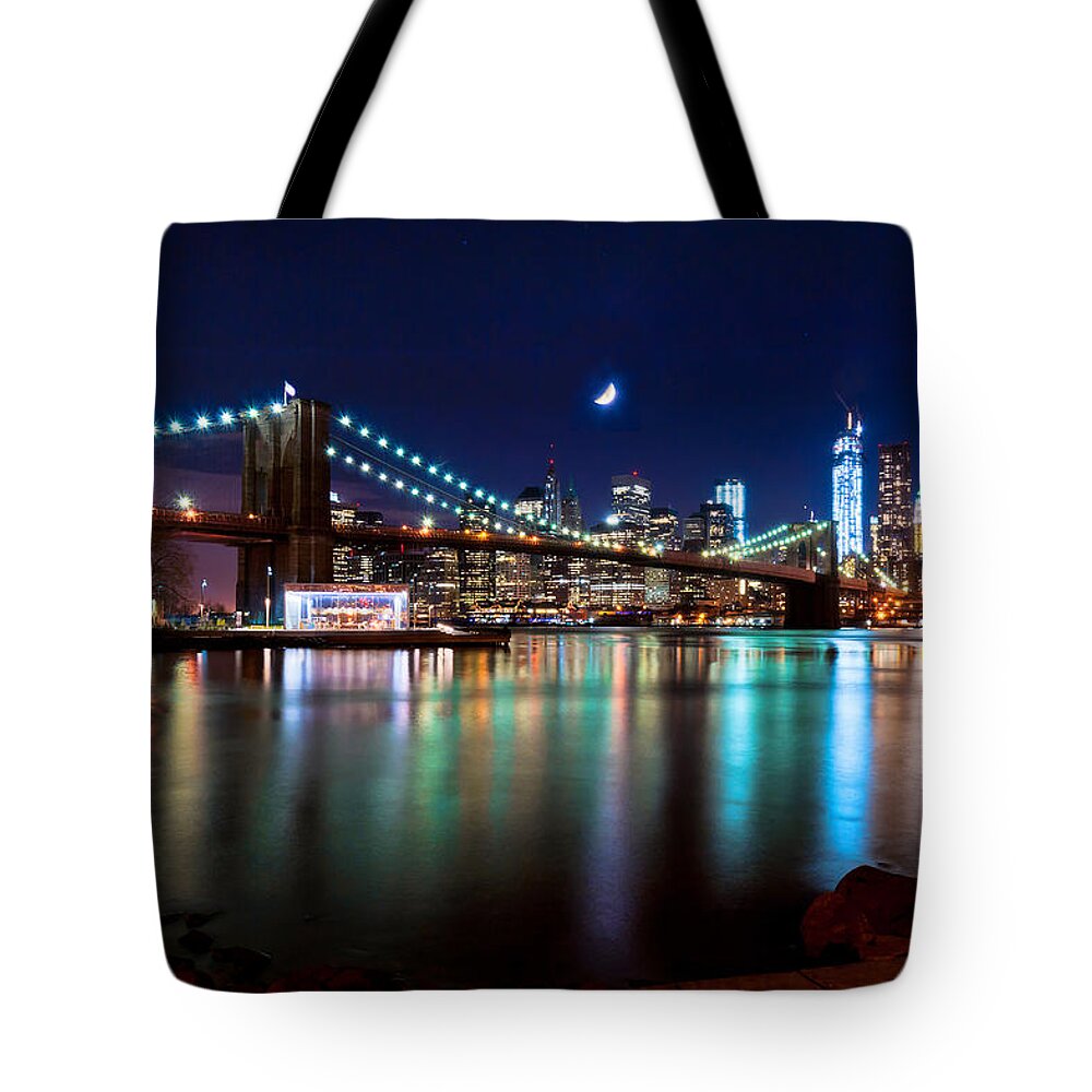 New York Tote Bag featuring the photograph New York Skyline and Brooklyn Bridge with Crescent Moon Rising by Mitchell R Grosky