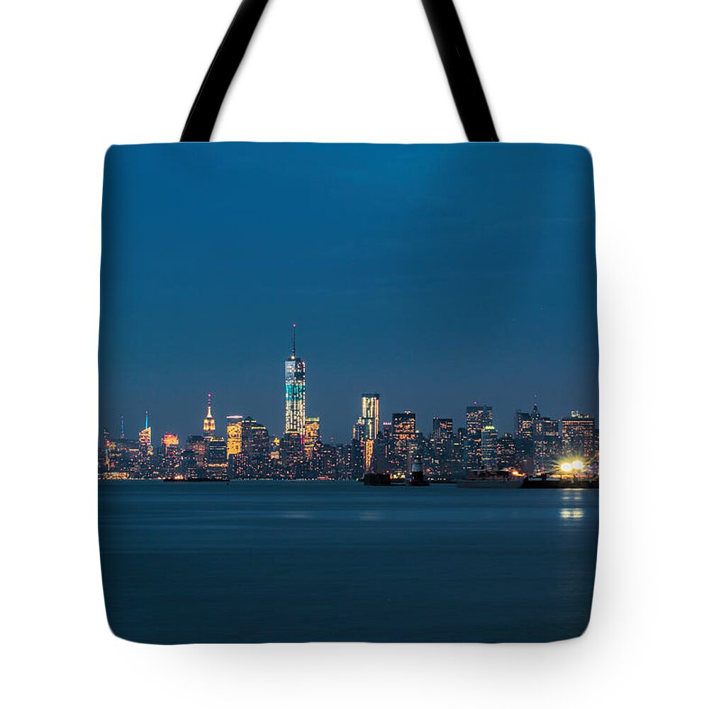 New York City Tote Bag featuring the photograph New York Twilight by Jonathan Davison
