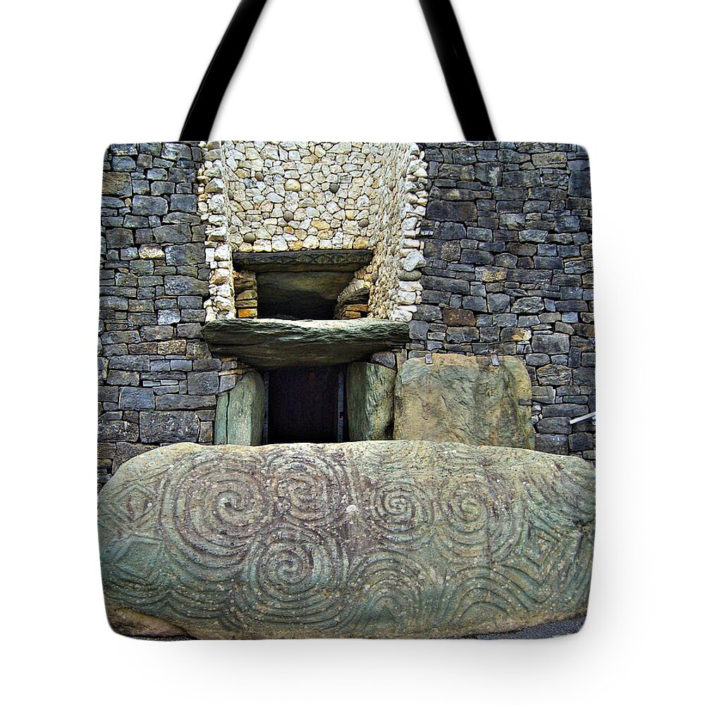 Newgrange Tote Bag featuring the photograph Newgrange entrance by Nina Ficur Feenan