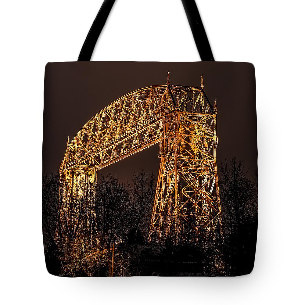 Aerial Tote Bag featuring the photograph Night At Duluth Aerial Lift Bridge by Paul Freidlund