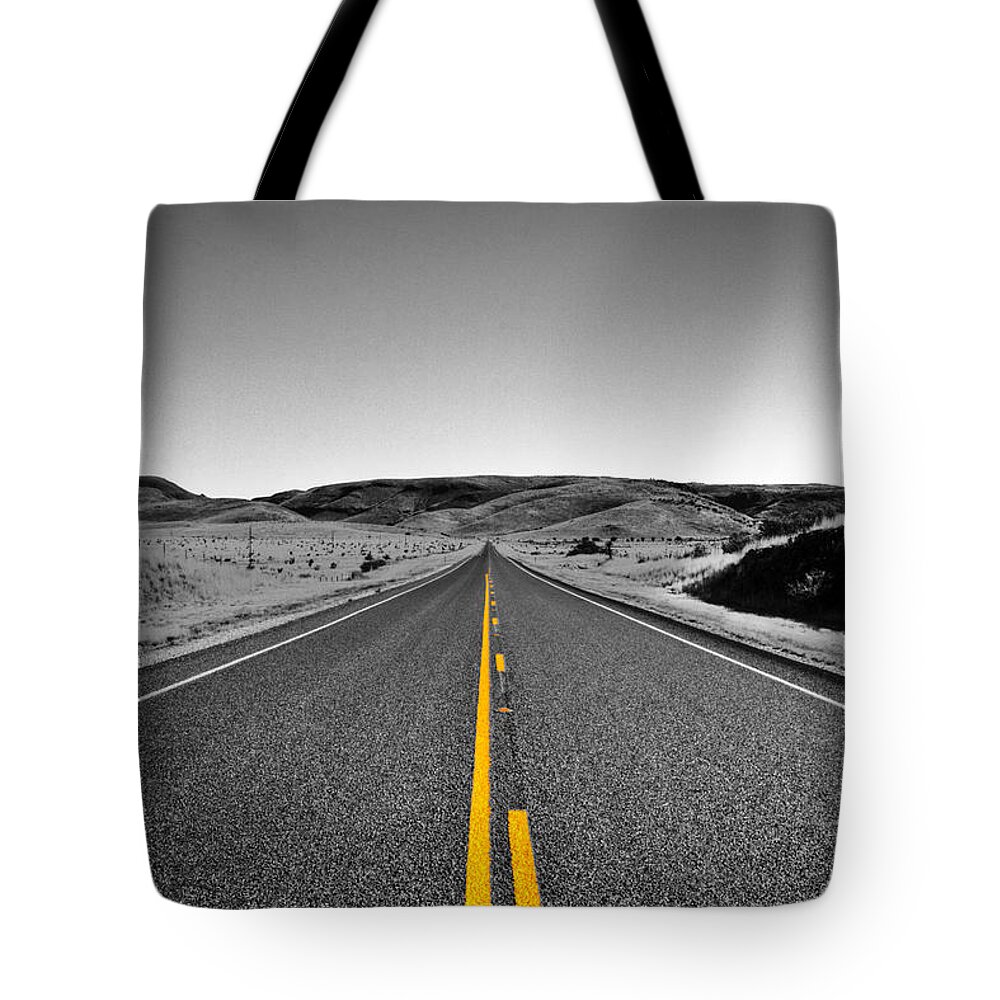 Fort Davis Tote Bag featuring the photograph No Country for Old Men II by Roger Passman