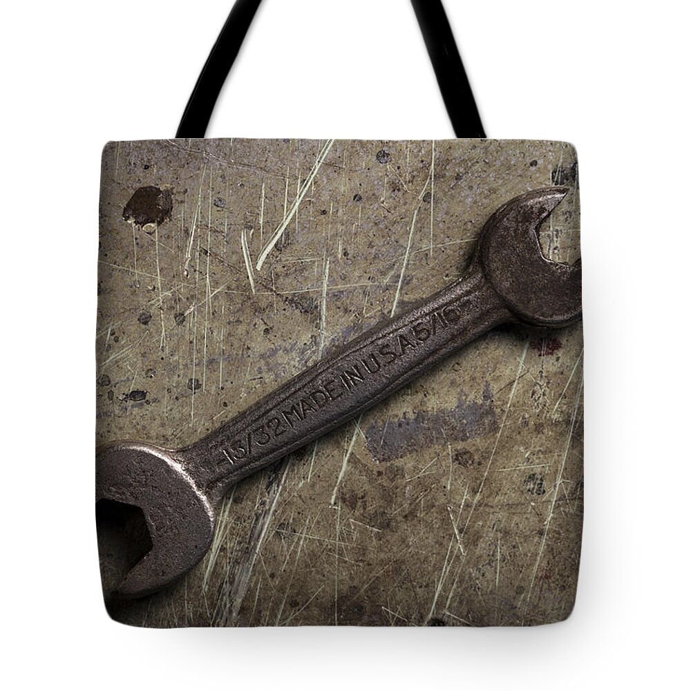 Andrew Pacheco Tote Bag featuring the photograph No Job Too Small by Andrew Pacheco