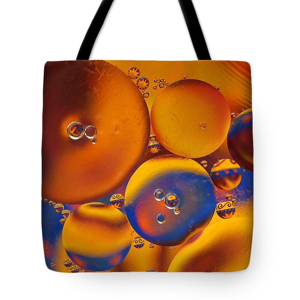 Oil And Water Tote Bag featuring the photograph Oil and Water Abstract Geometric by Liz Mackney
