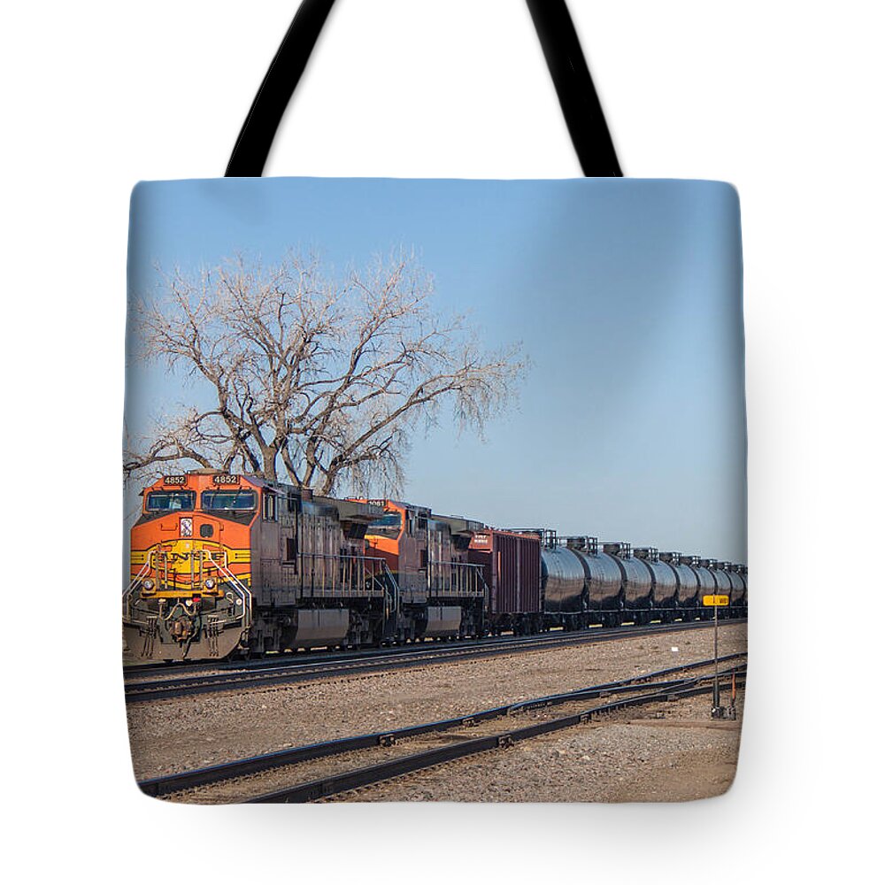 Bnsf Tote Bag featuring the photograph BNSF Oil Train in Dilworth Minnesota by Steve Boyko