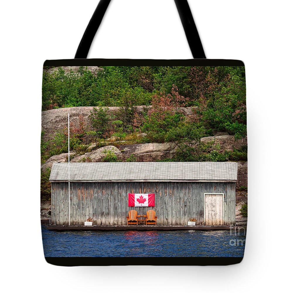 Boathouse Tote Bag featuring the photograph Old boathouse with two Muskoka chairs by Les Palenik