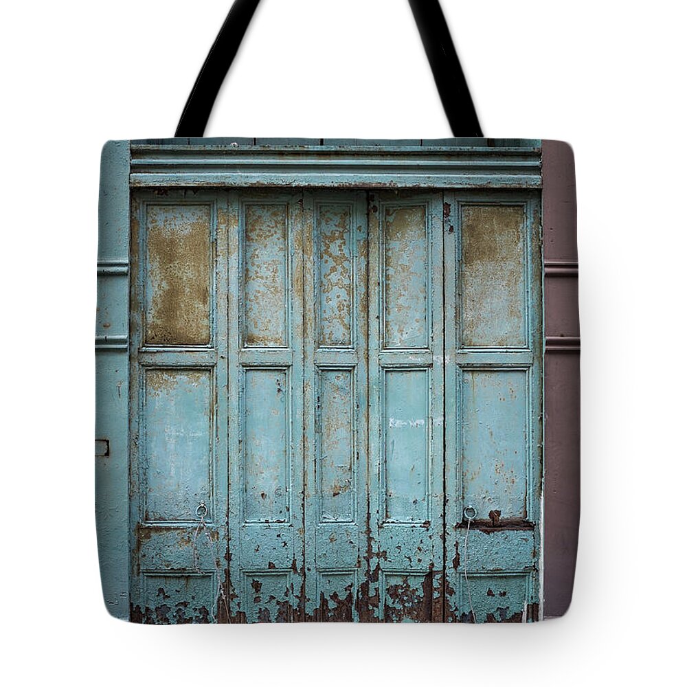 Shutter Tote Bag featuring the photograph Old Distressed Shutters by Spiderstock