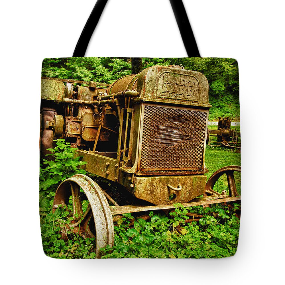 Antique Tote Bag featuring the photograph Old Farm Tractor by Sebastian Musial