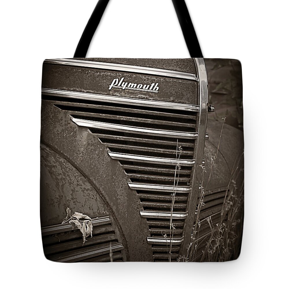 Automobile Tote Bag featuring the photograph Old Plymouth by Edward Fielding