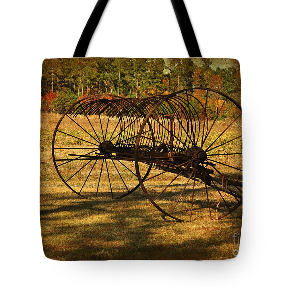 Hay Rake Tote Bag featuring the photograph Old Rusty Hay Rake by Kathy Baccari