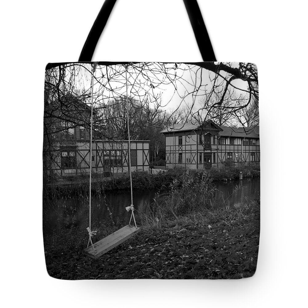 Amsterdam Tote Bag featuring the photograph Old Swing in Amsterdam by Brian Kamprath