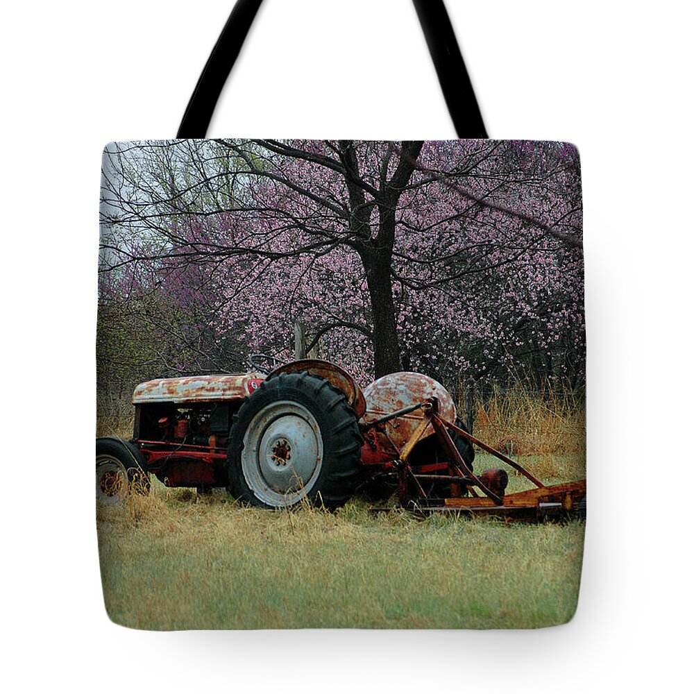 Tractor Tote Bag featuring the photograph Old Tractor and Redbuds by Jill Westbrook