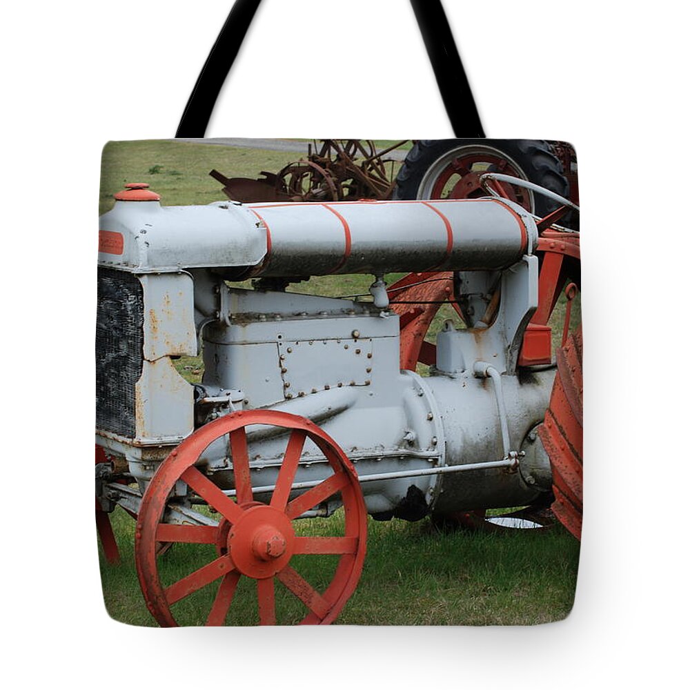 Antique Tote Bag featuring the photograph Old Tractor by Ron Roberts