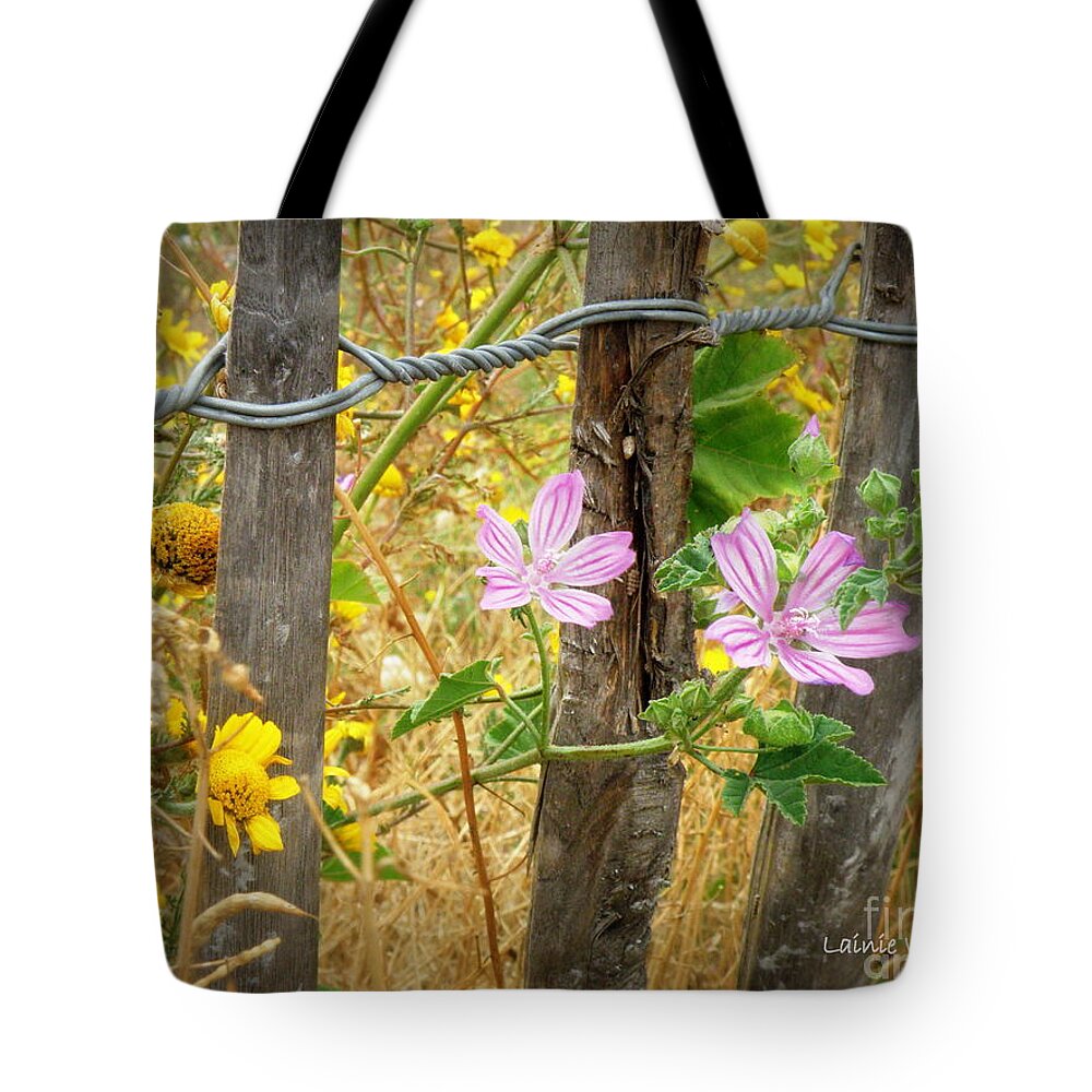 Fence Tote Bag featuring the photograph On the Fence by Lainie Wrightson