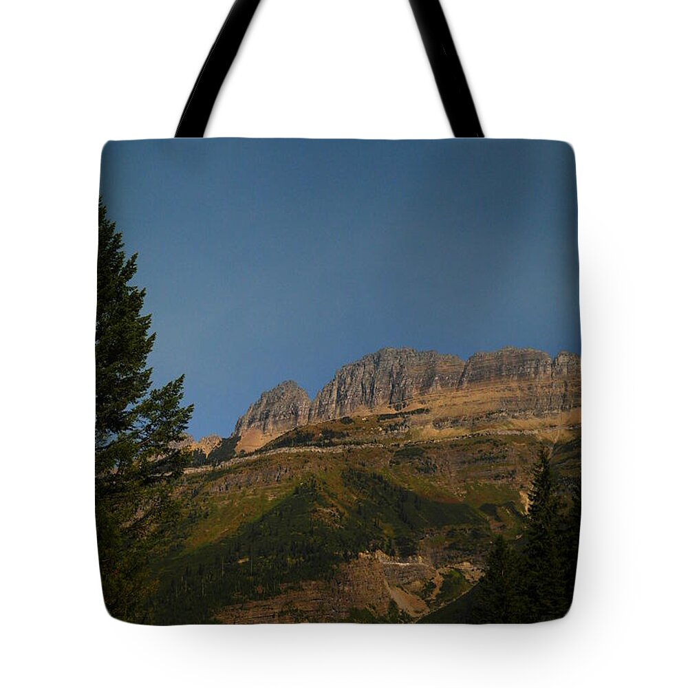 Glacier National Park Tote Bag featuring the photograph On The Going To The Sun Road by Jeff Swan