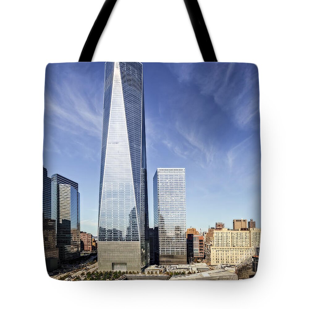 World Trade Center Tote Bag featuring the photograph One World Trade Center Reflecting Pools by Susan Candelario