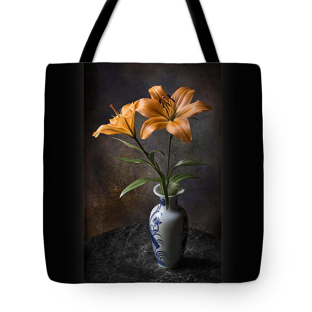 Flower Tote Bag featuring the photograph Orange Asiatic Lilies in Vase by Endre Balogh