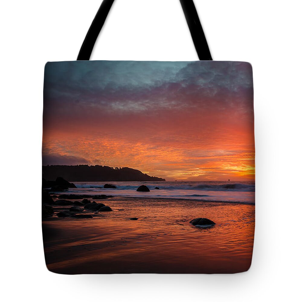 Seascape Tote Bag featuring the photograph Orange Glow by Linda Villers