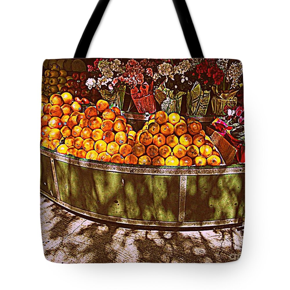 Fruitstand Tote Bag featuring the photograph Oranges and Flowers by Miriam Danar