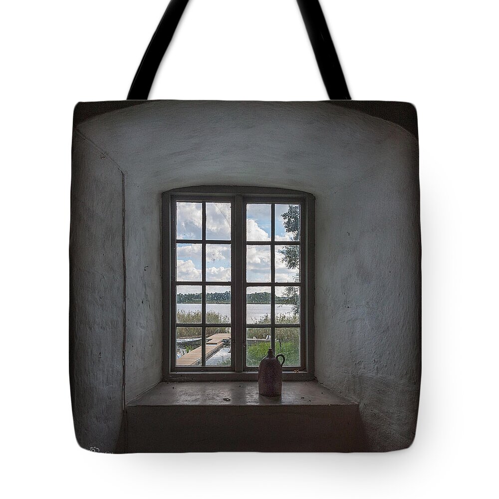 Outlook Tote Bag featuring the photograph Outlook by Torbjorn Swenelius