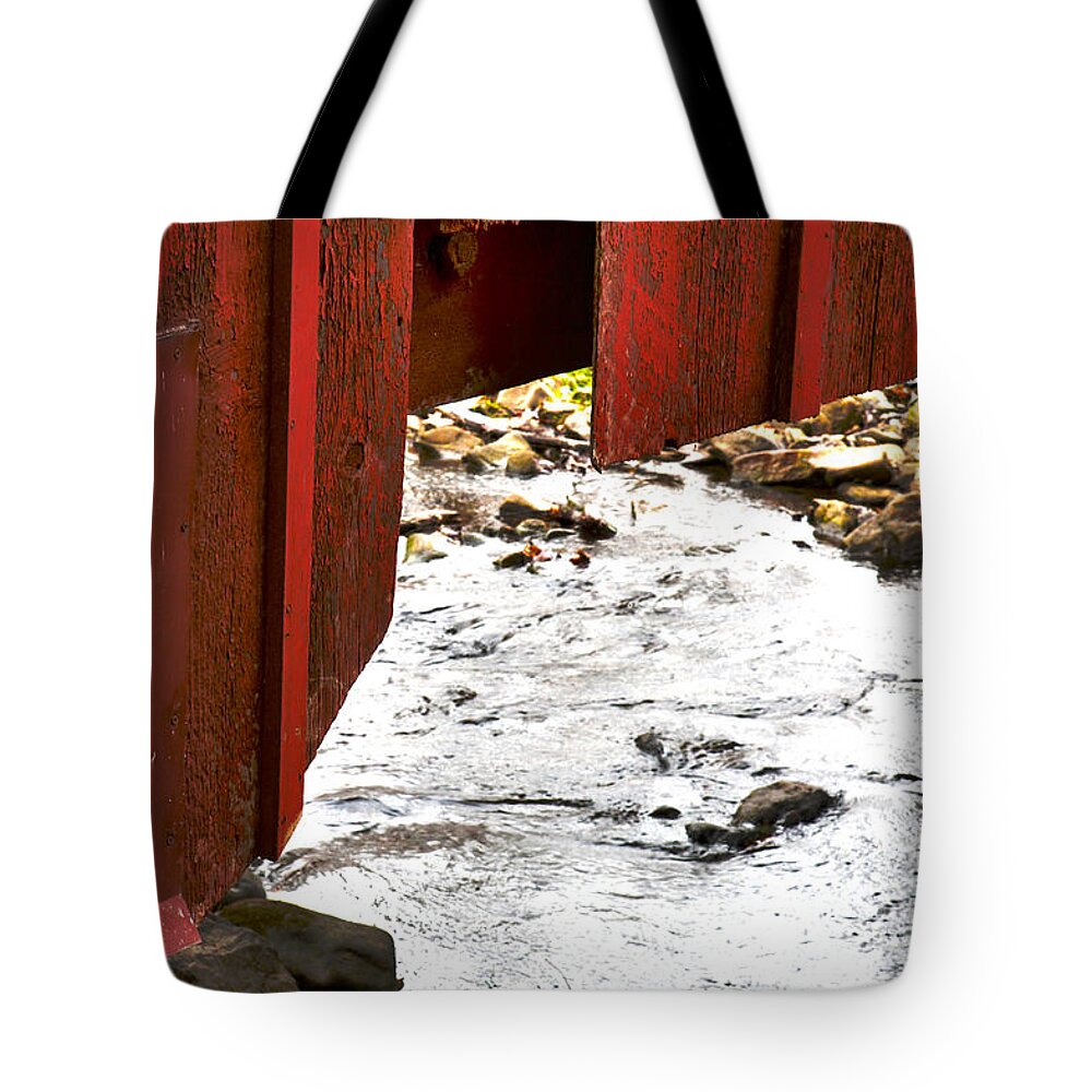 Rough Texture Boards Tote Bag featuring the photograph Overhang by Jeff Kurtz