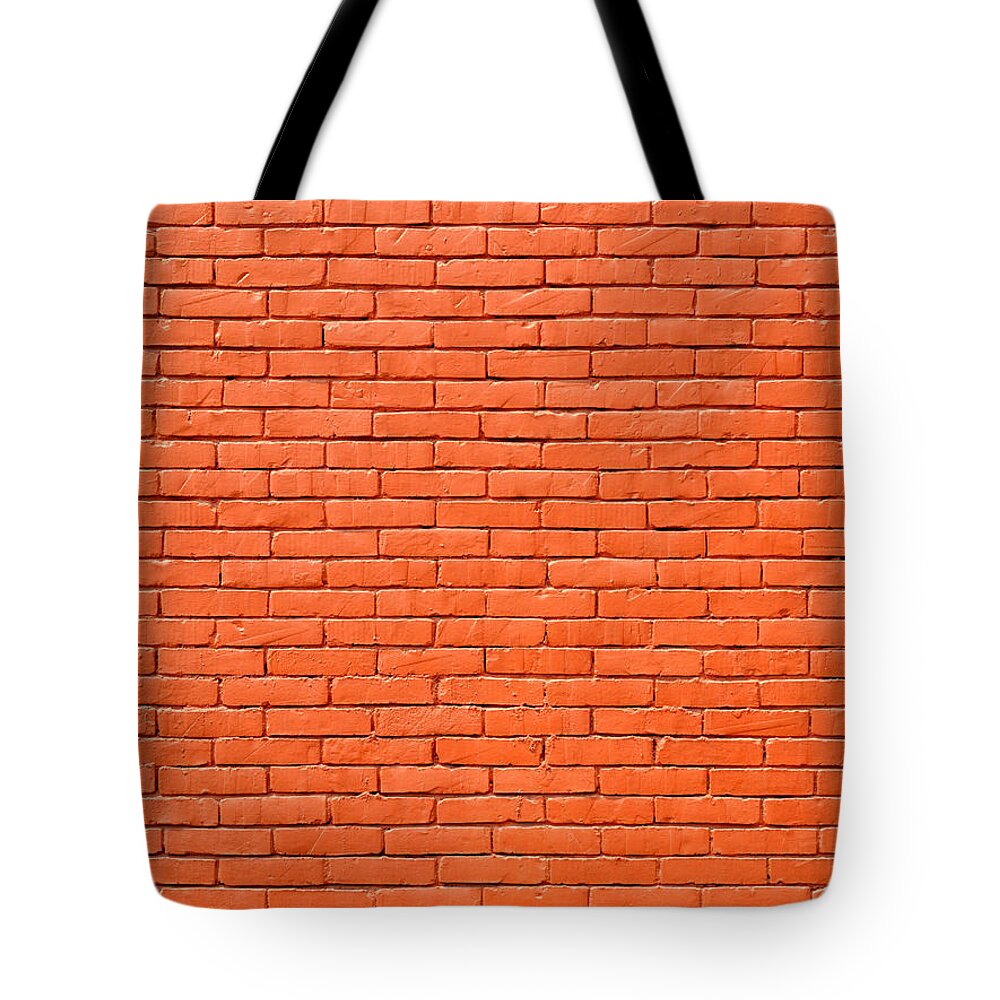 Brick Tote Bag featuring the photograph Painted brick wall by Dutourdumonde Photography