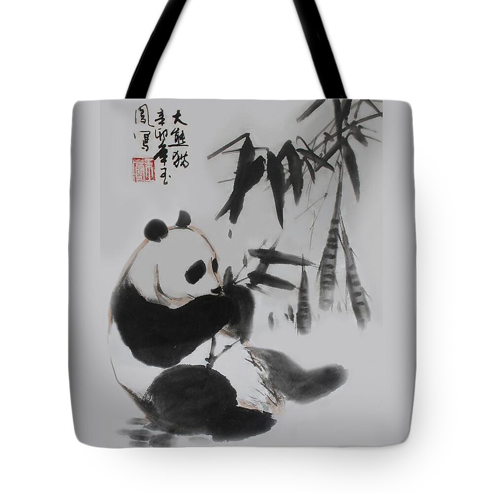 Panda Tote Bag featuring the photograph Panda and Bamboo by Yufeng Wang