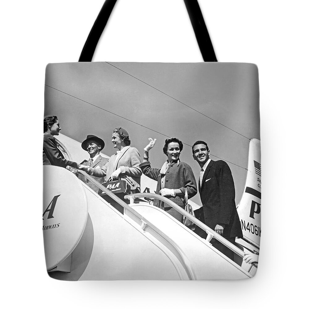 1950s Tote Bag featuring the photograph Passengers Board PanAm Clipper by Underwood Archives