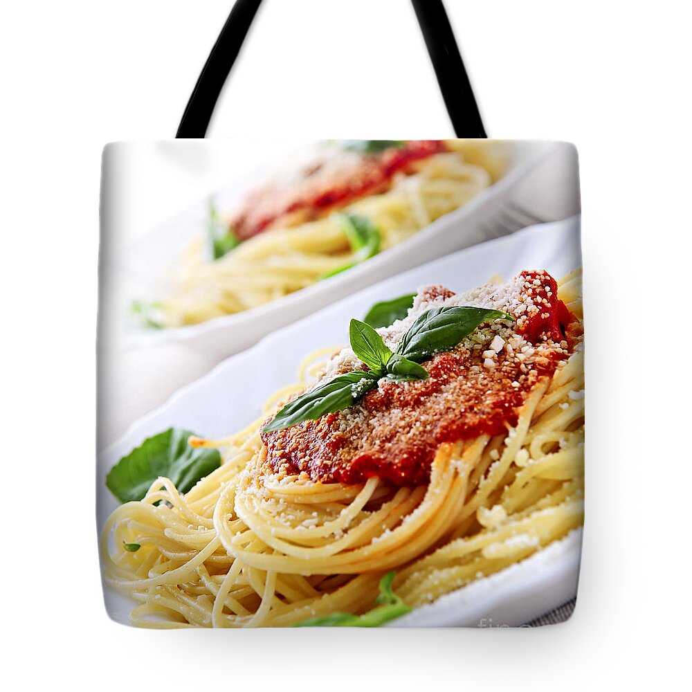 Pasta Tote Bag featuring the photograph Pasta and tomato sauce by Elena Elisseeva