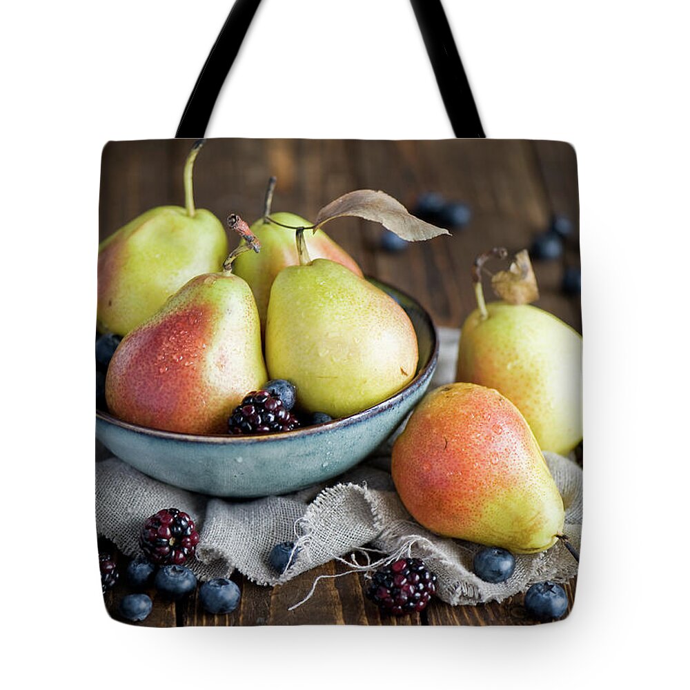 Large Group Of Objects Tote Bag featuring the photograph Pears by Verdina Anna