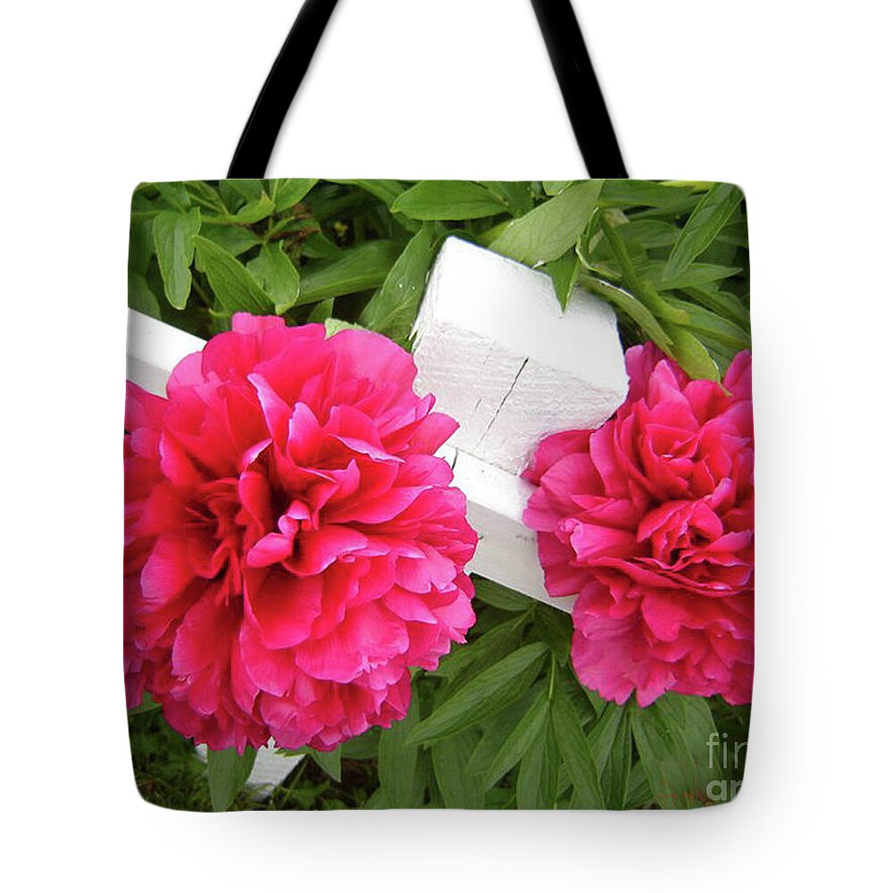 Resting Flowers Tote Bag featuring the photograph Peonies Resting on White Fence by Barbara A Griffin