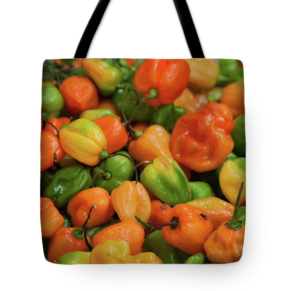 Orange Color Tote Bag featuring the photograph Peppers In Oaxaca Market by Jialiang Gao