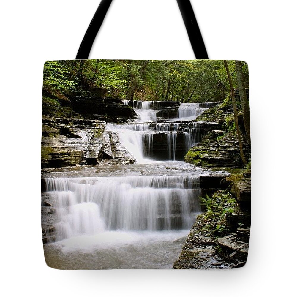 Waterfall Tote Bag featuring the photograph Perpetual Motion  by Justin Connor