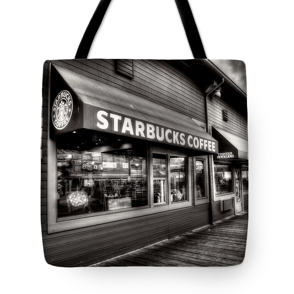 Starbucks Tote Bag featuring the photograph Pier 55 Starbucks by Spencer McDonald