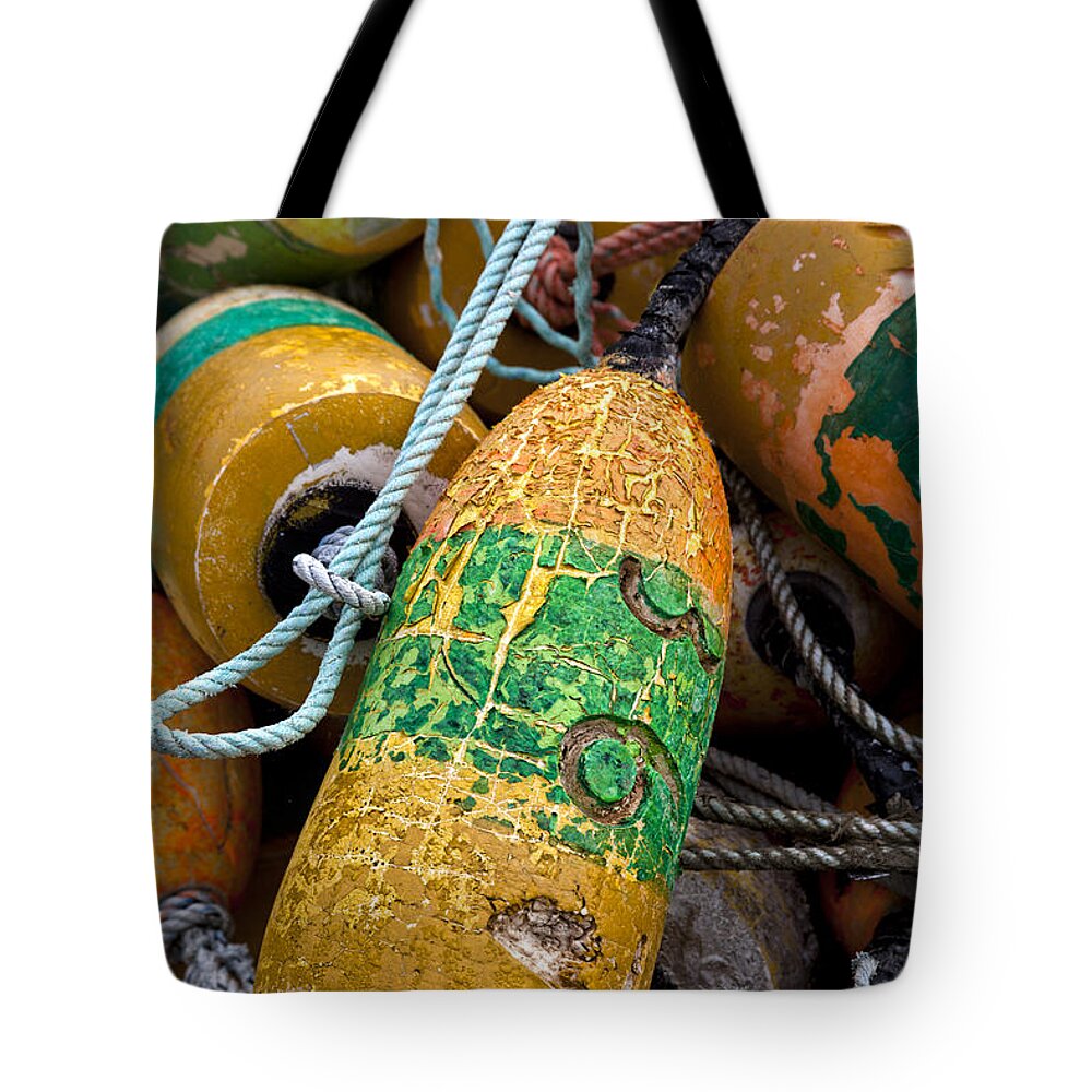 Newport Tote Bag featuring the photograph Pile of Colorful Buoys by Carol Leigh