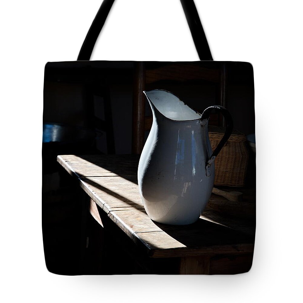 Pitcher Tote Bag featuring the photograph Pitcher On Table by Ron Weathers