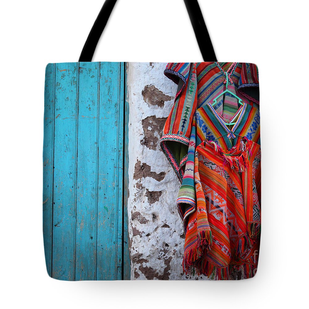 Peru Tote Bag featuring the photograph Ponchos for sale by James Brunker